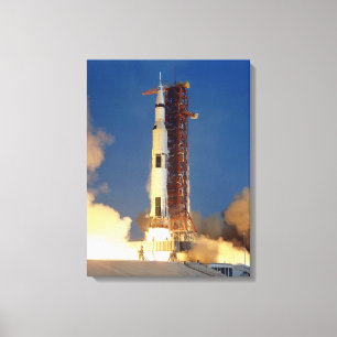 Earth Shakes as Saturn V Blazes Skyward to Moon Canvas Print