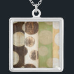 Earth Tone Wood Panel Painting with Circles Silver Plated Necklace<br><div class="desc">Created by Norman Wyatt, Jr., this painting was made utilising the French process known as Giclee to spray ink droplets onto a canvas. Get lost in the concentric circles, the melding of earth tone colours across the painting, or the wood panel look of the piece. A great purchase for anyone...</div>