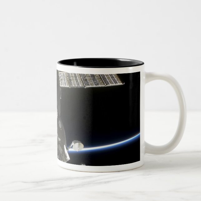 Earth's limb intersects a Soyuz spacecraft Two-Tone Coffee Mug (Right)