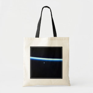 Earth's Thin Line Of Atmosphere And A Gibbous Moon Tote Bag