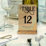 Earthtone Retro Swirls Wedding Table Number<br><div class="desc">Make it easy for your guests to find their tables with these fun retro swirls table number cards. The design features a background of swirling stipes in neutral earthtone colours including tan, taupe, and sage green. The lettering is done in a fancy block font with swashes and swirls making it...</div>