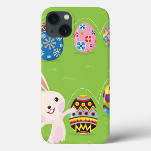 Easter bunny playful with painted eggs iPhone 13 case