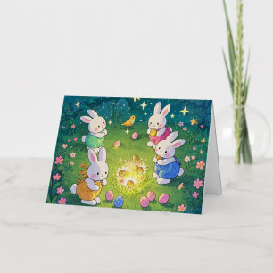Easter cartoon bunnies hiding eggs in a garden foil greeting card