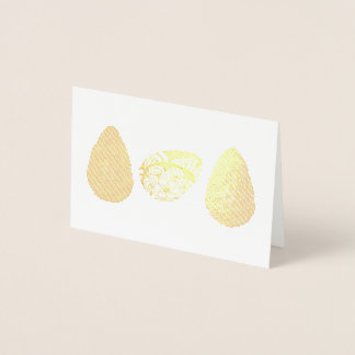 Easter eggs lined up with different colours and foil card
