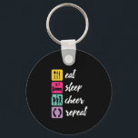 Eat Sleep Cheer Repeat Cheerleading Cheerleader Key Ring<br><div class="desc">Eat sleep cheer cheerleading merchandise for your favourite cheerleader who's always cheering and supporting the sports team with colourful pom poms, energetic dance routines. This vintage and retro design is great for team spirit when entering competition. Perfect gift for high school or college cheerleading squad, coach or fans of any...</div>