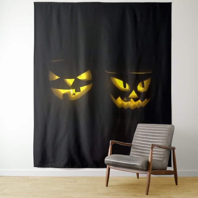 Eerie yellow glow pumpkin faces on black  tapestry (In Situ)