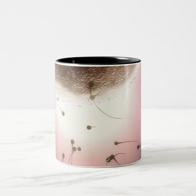 Egg being fertilised by sperm Two-Tone coffee mug (Center)