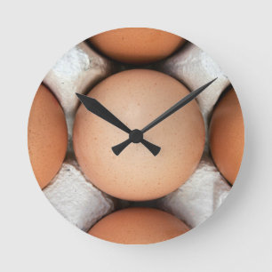 Eggs in a box round clock
