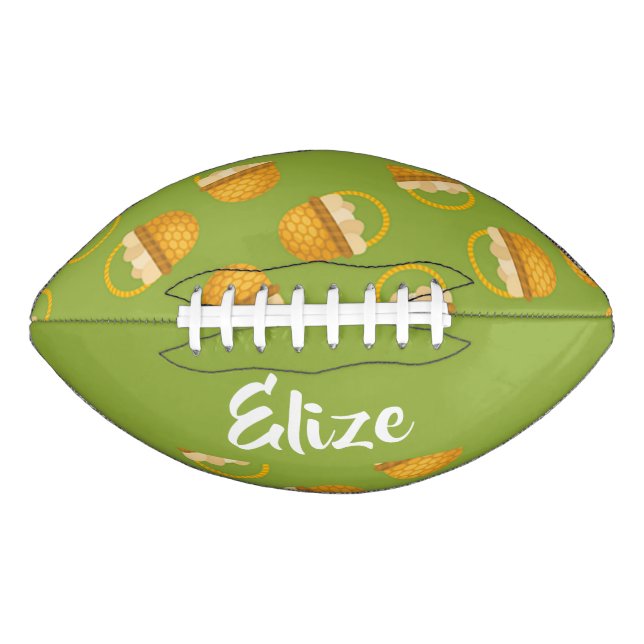 Eggs in brown basket on green football (Front)