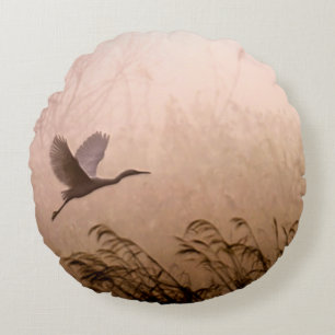 Egret Flying in Fog at Sunrise Round Pillow