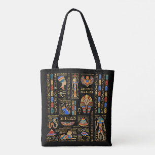 Egyptian hieroglyphs and deities on black tote bag