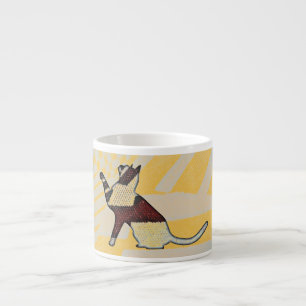 Egyptian-style cat sitting, ceramic cappuccino cup