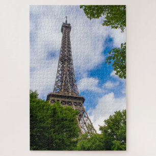 Eiffel tower between blue sky and trees, Paris Jigsaw Puzzle