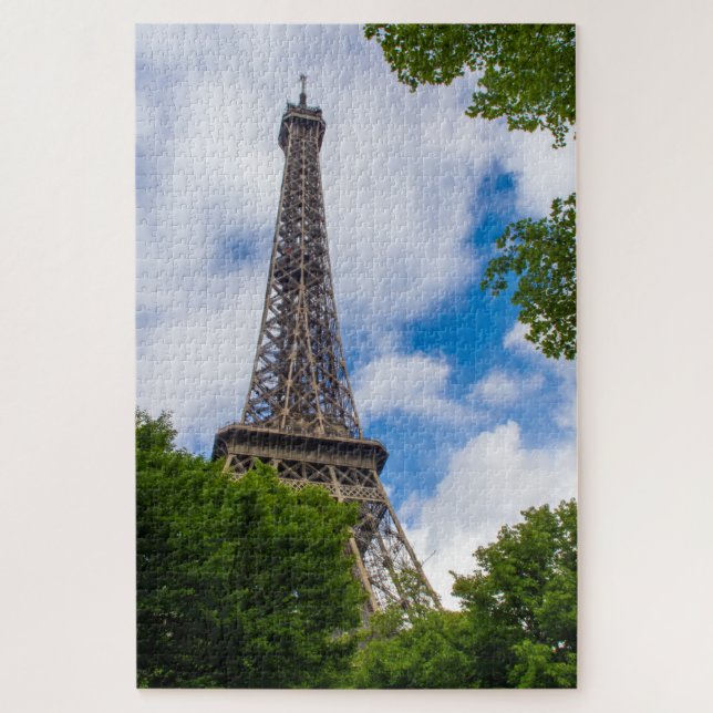 Eiffel tower between blue sky and trees, Paris Jigsaw Puzzle (Vertical)