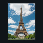 Eiffel Tower View from Champ de Mars Public Park Postcard<br><div class="desc">Paris France Eiffel Tower seen from Champ de Mars park with green lawn and visitors under sunny sky</div>