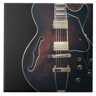 Electric Guitar On Black Tile