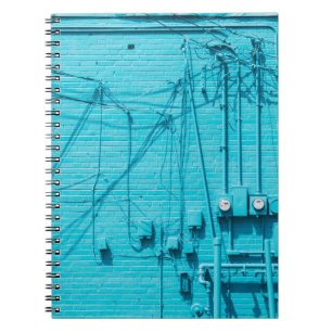 ELECTRIC METER ON BLUE BRICK WALL NOTEBOOK