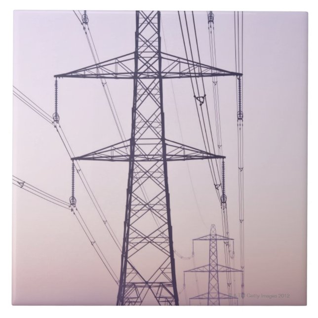 Electricity pylons in mist at dawn. tile (Front)