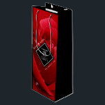 Elegant 15th Rose Wedding Anniversary Celebration Wine Gift Bag<br><div class="desc">Celebrate the 15th rose wedding anniversary with this stylish wine bottle gift bag! Elegant white lettering on a romantic red rose background add a memorable touch for this special occasion and milestone. Personalise with the couple's names and years of marriage. Reverse shows identical design. Design © W.H. Sim. See more...</div>