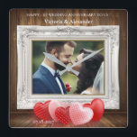Elegant 1st Wedding Anniversary Photo Clock<br><div class="desc">Celebrate your love with this beautifully designed custom photo wall clock! Featuring a classic wood panel background, ornate white frame, romantic heart graphics, and personalised names and date, it’s the perfect keepsake for your 1st wedding anniversary. Customise with your favourite photo, names, and date for a truly unique gift that...</div>