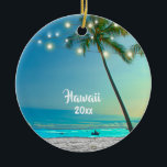 Elegant 2 Sided Photo Hawaii Palm Trees Lights Ceramic Tree Decoration<br><div class="desc">Create a keepsake of your trip to Hawaii with this custom elegant ornament featuring a landscape photograph of tropical palm trees standing over a sandy Hawaiian beach and boar, enhanced with string lights, with the year on the front, and your own photo on the back. Easy to customise with the...</div>