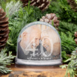 Elegant 40th Anniversary Couple's Names 2-Photo Snowglobe<br><div class="desc">Honour four decades of love and commitment with this personalised 40th wedding anniversary photo snow globe. Thoughtfully designed to celebrate the ruby anniversary milestone, this custom keepsake features your chosen photo on the front, alongside the number “40 years” and the couple’s names. On the back, a second photo can be...</div>