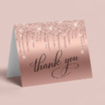 Elegant 60th Birthday Party Rose Gold Glitter Thank You Card<br><div class="desc">Chic 60th birthday party folded thank you card featuring "Thank You" in elegant calligraphy,  a rose gold faux foil background and rose gold faux glitter. On the inside,  personalise your thank you message and signature or leave blank for a handwritten note.</div>