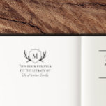 Elegant Antler Shield Monogram Book Belongs To Self-inking Stamp<br><div class="desc">Elegant and rustic bookplate self inking stamp with your initial on a shield with antlers. This book belongs to the library of your name!</div>