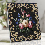 Elegant Black and Gold Floral Baroque Tile<br><div class="desc">Enhance your décor with this luxurious tile featuring a stunning floral bouquet surrounded by ornate gold Baroque scrollwork on a rich black background. Perfect for backsplashes,  accent walls,  or creating a statement piece,  this design brings timeless sophistication and elegance to any space.</div>
