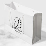 Elegant Black and White Personalised Bridesmaid Large Gift Bag<br><div class="desc">Elegant Black and White Personalised Bridesmaid Gifts
featuring personalised monogram in elegant calligraphy font style with bridesmaid's name and title in classic serif font style.

Also perfect for Maid of Honour,  Flower Girl,  Mother of the Bride and more.</div>