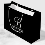 Elegant Black and White Personalised Bridesmaid Large Gift Bag<br><div class="desc">Elegant Black and White Personalised Bridesmaid Gifts
featuring personalised monogram in elegant calligraphy font style with bridesmaid's name and title in classic serif font style.

Also perfect for Maid of Honour,  Flower Girl,  Mother of the Bride and more.</div>