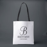 Elegant Black and White Personalised Bridesmaid Tote Bag<br><div class="desc">Elegant Black and White Personalised Bridesmaid Gifts
featuring personalised monogram in elegant calligraphy font style with bridesmaid's name and title in classic serif font style.

Also perfect for Maid of Honour,  Flower Girl,  Mother of the Bride and more.</div>