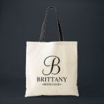 Elegant Black and White Personalised Bridesmaid Tote Bag<br><div class="desc">Elegant Black and White Personalised Bridesmaid Gifts
featuring personalised monogram in elegant calligraphy font style with bridesmaid's name and title in classic serif font style.

Also perfect for Maid of Honour,  Flower Girl,  Mother of the Bride and more.</div>