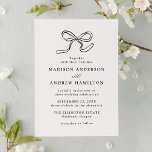 Elegant Black Bow Wedding Invitation<br><div class="desc">Invite your guests with timeless elegance using this minimalist wedding invitation. The design features a delicate hand-drawn black bow at the top, adding a romantic and whimsical touch to the classic black and white design. Your names and wedding details are displayed below in refined serif and script typography, creating a...</div>
