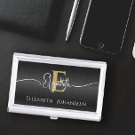 Elegant Black Brushed Metal Girly Gold Monogrammed Business Card Holder<br><div class="desc">Elevate your networking game with our 'Elegant Black Brushed Metal Girly Gold Monogrammed Business Card Case'! This sleek case offers sophistication and personalisation, featuring a brushed metallic black background, a bold gold monogram, and a chic white girly script name. Personalise it further by adding your full name below the monogram....</div>