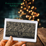 Elegant Black& Gold Floral Monogram Business Card Holder<br><div class="desc">Beautiful Modern Gold Floral Pattern on a Black background with a monogram and name on this business card holder. Both can be easily updated, if you want to keep the Monogram without the name, delete the name in the personalisation field. You can find a matching tie, a lighter, and socks...</div>
