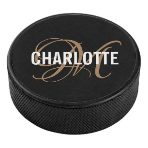 Elegant black gold monogram name hockey puck