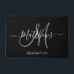 Elegant Black Grey Monogram Script Family Name Doormat<br><div class="desc">Personalised black and white and grey monogram design with bride and groom last name and wedding date on a black background. Makes a unique and great gift for newlyweds starting a new family. Great for new house together. Customise with your name, monogram initial and wedding date and colours. Elke Clarke©...</div>