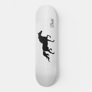 Elegant black horse silhouette on grey gradient skateboard