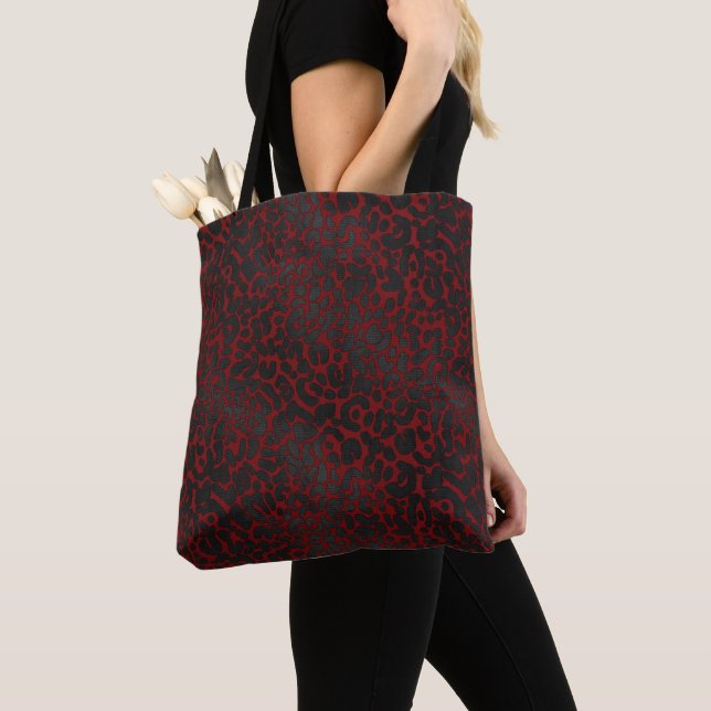 Elegant Black Leopard Animal Print on Red Tote Bag (Close Up)