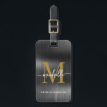 Elegant Black Metal Gold Monogram Initial Script Luggage Tag<br><div class="desc">Girly Stylish Modern Elegant Black Metal and Gold Monogram Initial Name Script Custom Personalised Personalised Luggage Bag Tag. This design featuring a first name in a pretty hand lettered swash tail font calligraphy (or typography) with monogram initial, full name, address info in gold on black faux mettalic foil background. These...</div>