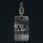 Elegant Black Metal Gold Monogram Initial Script Luggage Tag<br><div class="desc">Girly Stylish Modern Elegant Monogram Initial Name Script Black Metal Custom Personalised Personalised Luggage Bag Tag. This design featuring a first name in a pretty hand lettered swash tail font calligraphy (or typography) with monogram initial, address info on faux black metallic foil background. These are easy to customise it. Stylish...</div>