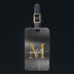 Elegant Black Metal Gold Monogram Initial Script Luggage Tag<br><div class="desc">Girly Stylish Modern Elegant Black Metal and Gold Monogram Initial Name Script Custom Personalised Personalised Luggage Bag Tag. This design featuring a first name in a pretty hand lettered swash tail font calligraphy (or typography) with monogram initial, address info in gold and white on faux black metallic foil background. These...</div>
