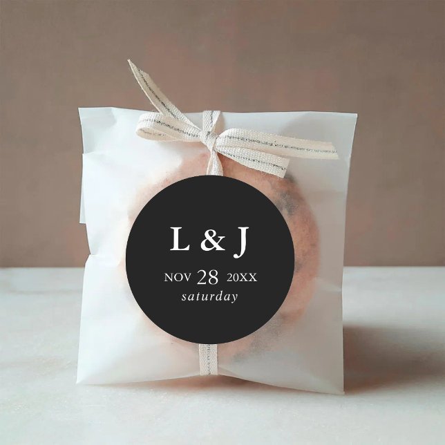 Elegant Black Modern Calligraphy Wedding Classic Round Sticker (Elegant black calligraphy wedding sticker adds modern charm to favor packaging.)