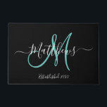 Elegant Black Teal Monogram Script Family Name Doormat<br><div class="desc">Personalised black and white and teal monogram design with bride and groom last name and wedding date on a black background. Makes a unique and great gift for newlyweds starting a new family. Great for new house together. Customise with your name, monogram initial and wedding date and colours. Elke Clarke©...</div>