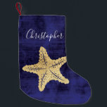 Elegant Blue Gold Beach Sea Star Monogrammed Small Christmas Stocking<br><div class="desc">Elegant gold coloured ocean sea star or starfish with monogrammed name. Blue background. Perfect for beach cottage theme or nautical Christmas.</div>