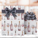 Elegant Blush Pink Rosé Wine Wrapping Paper<br><div class="desc">This wine-themed wrapping paper is perfect for adding a touch of charm to any gift for wine lovers. Featuring lines of wine bottles and glasses, the design is both playful and elegant. For a subtle personal touch, you can add a name or short phrase sporadically throughout the pattern, making each...</div>
