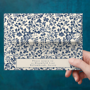 Elegant botanical-themed blue and cream envelope