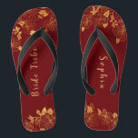Elegant Bride Tribe Dark Burgundy & Gold Foliage  Jandals<br><div class="desc">These elegant bride tribe dark burgundy and gold foliage pattern flip flops have a dark burgundy background that is adorned with an intricate gold floral greenery pattern and customisable modern typography. The combination of the rich burgundy and the shimmering gold create an elegant and luxurious aesthetic. It's a beautiful gift...</div>