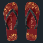 Elegant Bridesmaid Deep Burgundy & Gold Floral Jandals<br><div class="desc">These elegant bridesmaid Deep Burgundy and gold floral pattern flip flops have a dark burgundy background that is adorned with an intricate gold floral greenery pattern and customisable modern typography. The combination of the rich burgundy and the shimmering gold create an elegant and luxurious aesthetic. It's a beautiful gift for...</div>